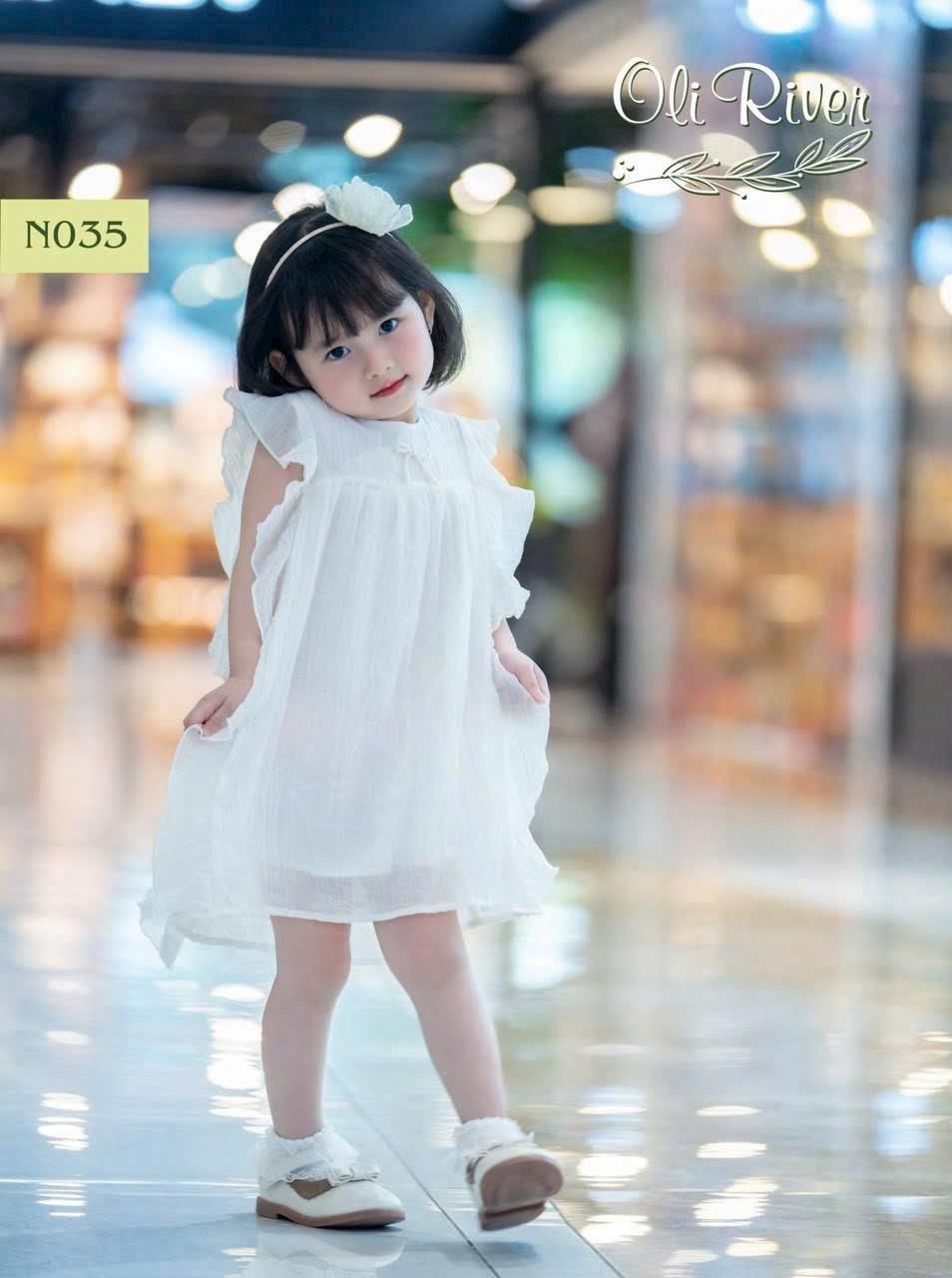 Đầm bé gái màu trắng